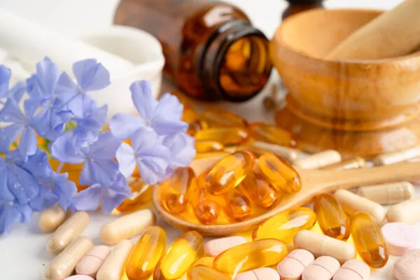 Alternative medicine herbal organic capsule with vitamin E omega